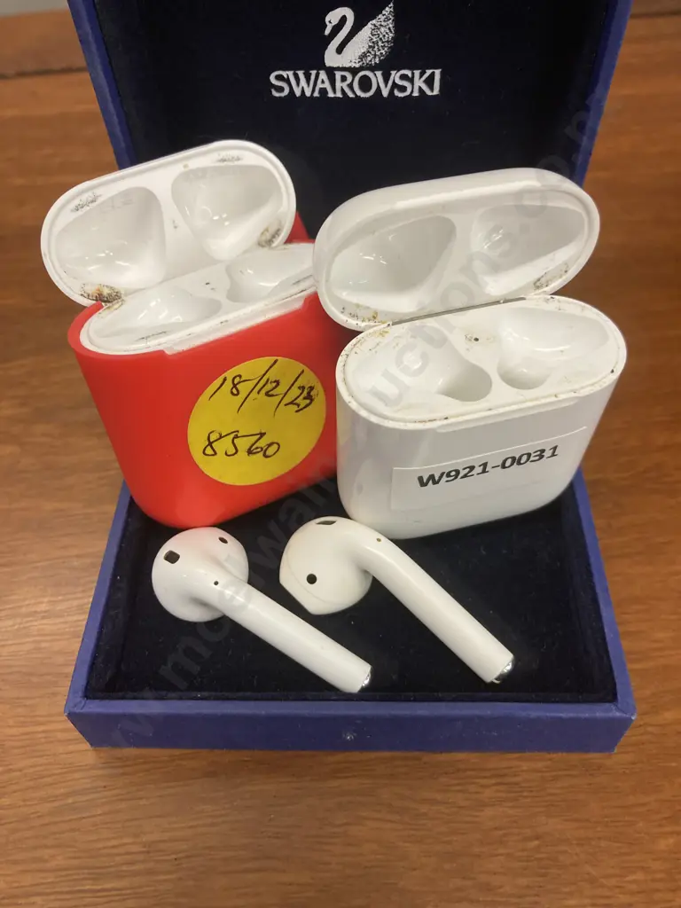 Pair of Single Apple AirPods With Charging Cases & a Red Cover (Model A1602) Image 1++
